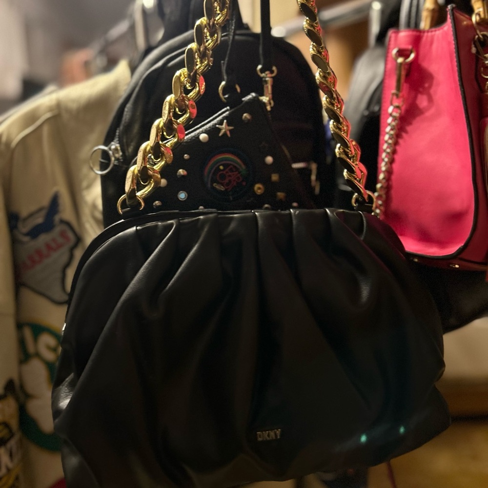 Black DKNY purse with gold chain handle